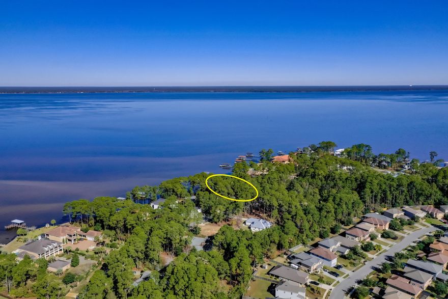 Exceptional waterfront lot located on the scenic Choctawhatchee Bay in Santa Rosa Beach, Florida!Measuring 102' along the pristine shoreline, this coveted lot will accommodate the most fabulous custom home!The seawall and significant reinforcement of rip-rap has recently been constructed for the Buyer's cost-effective convenience to embark upon construction of a main home and the possibility of a carriage home. A boundary & topographical survey is uploaded to this listing. A dock plan is approved. An existing house plan is approved and available for review upon request. Please inquire for further details.