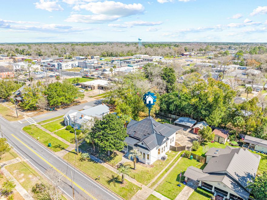 100% financeable------PRICED BELOW MARKET FOR QUICK SALE!!!! Newly Painted inside and outside. Don't miss this charming home in Chipley, FL with custom woodwork around the wrap around porch. 4 Car Carport in back. Cosmetic touches needed by its new owner to complete. Historical home built in 1904 with approx. 3343 SF of living space with 3 bedrooms downstairs. Original Master on first floor with additional sitting room. 1 New Master/Large Bedroom upstairs with bathroom. PRIOR updates: Roof and AC 2019, 2020 Gas Tankless Water Heater, 2nd AC unit 2004. Plumbing updated within the last 2 years. Wiring updated but still some work may be needed. Fireplaces have been sealed but Frames still in place for other options. Solar Panels - Paid in full. Bay Windows on bottom floors, Windows have been fixed to work, some may need further repair. Hardwood flooring, Vinyl & Laminate,. Baths have Tile floors. Kitchen has minimal appliances (Refrig., Gas Stove, Dishwasher), unknown condition. New Water Softener, will remain, unconnected. Has Water/Sewer connections. Come get your chance to make this your dream home with a little work. Call for your appointment today!