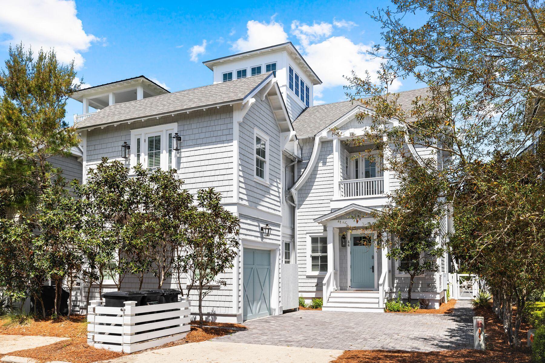 Welcome home to 44 Tidepool Lane, located in the gulf-front community of WaterSound Beach. Nestled on serene ''Puttering Park,'' this gracious residence offers a private oasis in an idyllic location. With its thoughtful layout spread across multiple floors, this stunning home ensures unparalleled comfort and convenience for modern living. Upon entering the first floor, you're greeted by an expansive great room seamlessly blending with the dining area and kitchen. Adorned with a tabby finished gas fireplace, rough-hewn beams, white-washed oak floors and shiplap throughout, this open-concept space sets the stage for entertaining or family gatherings. The gourmet kitchen is a chef's delight, boasting high-end appliances by Viking, Signature Series, Uline ice maker and pot filler. Custom cabinetry, aquamarine quartz countertops and arched architectural details add sophistication. Step onto the large screened porch, complete with fireplace, TV and access to the heated pool with swim deck, offering private views of the park. The primary suite on the first level features an ensuite bathroom with two detached vanities and a private screened patio, providing a tranquil retreat. Ascending to the second floor reveals a versatile mother-in-law suite with a morning kitchen, private balcony and ensuite bathroom, balancing independence and connectivity. The third floor is dedicated to luxury and leisure, featuring a spacious seating area with built-in seating and a TV. Accommodations include a charming bunk room, guest room with ensuite bath and balcony and an additional opulent primary suite with double vanities, soaking tub, shower and private balcony. The fourth floor boasts a bonus room with two twin beds, ideal for accommodating guests or various activities. Recent updates include a revamped screened patio, repositioned windows and doors for enhanced views and access to the pool area, a new pool deck, fresh interior and exterior paint and a built-in bunk room. The house is equipped with a central vacuum system. Throughout this exceptional property, meticulous attention to detail and quality craftsmanship promise a lifestyle of comfort, luxury and convenience. 
