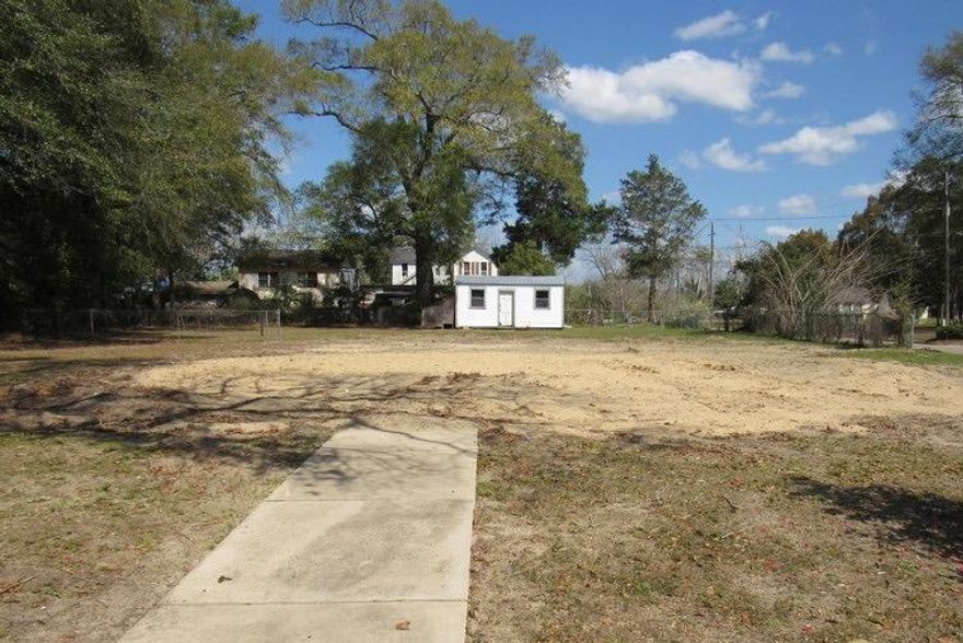 Located in the historical district in the heart of the City of Defuniak Springs, this REO property is ready to go today! A corner lot property, this nearly .25 acre parcel is level and cleared. Previously housed a larger home that had to be demolished due to conditions, building here should be a breeze! Call before it's gone.