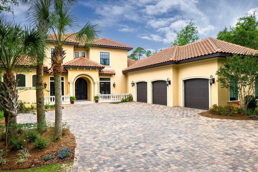 The gourmet kitchen is a culinary enthusiast's dream, boasting top-of-the-line appliances, gorgeous cabinetry,  and two oversized center islands perfect for both casual dining and entertaining. The spacious living room offers ample natural light from the wall-to-wall windows that frame panoramic views overlooking the pool and outdoor kitchen.Retreat to the master suite, a sanctuary of serenity and indulgence. This private oasis features a palatial bedroom with a sitting area, a spa-like en-suite bathroom with a soaking tub and a luxurious walk-in shower, and an expansive walk-in closet with custom organizers. Additional bedrooms and bathrooms are thoughtfully designed and impeccably appointed, ensuring comfort and privacy for family members and guests alike.