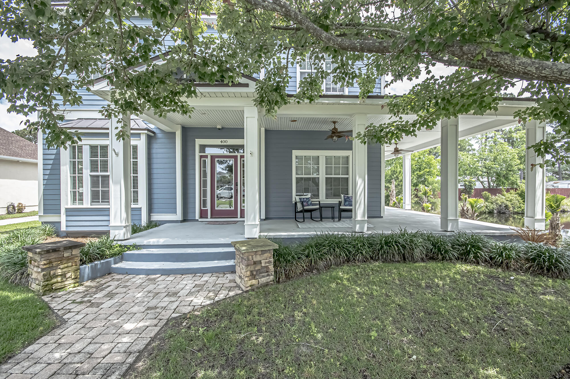 Welcome to 400 Liverepool Ave, a stunning, home located in the desirable Tapestry Park neighborhood. This meticulously cared for home includes HardiBoard siding and soffits, new roof, and impact glass storm-rated windows. A spacious kitchen accentuated by granite countertops, elegant freestanding tub and separate shower in the Master bath, Aside from the the immaculate interior charm on the exterior you will notice, a fountain enriched pond that enhances the outdoor entertaining area, lush landscaping like no other in Tapestry Park. This neighborhood provides amenities that include an inviting club house and swimming pool, tennis court, basketball court, green space, and a children's playground. The neighborhood is an ideal half mile bike ride to the beach or Holiday Golf Club. Pier Park and Frank Brown Park, which boast dining and recreation activities galore, are also convenient destinations within three miles. Hutchison Beach Elementary is just across Clara Ave. A superb home in a neighborhood with desirable amenities in a perfect location is attainable now!