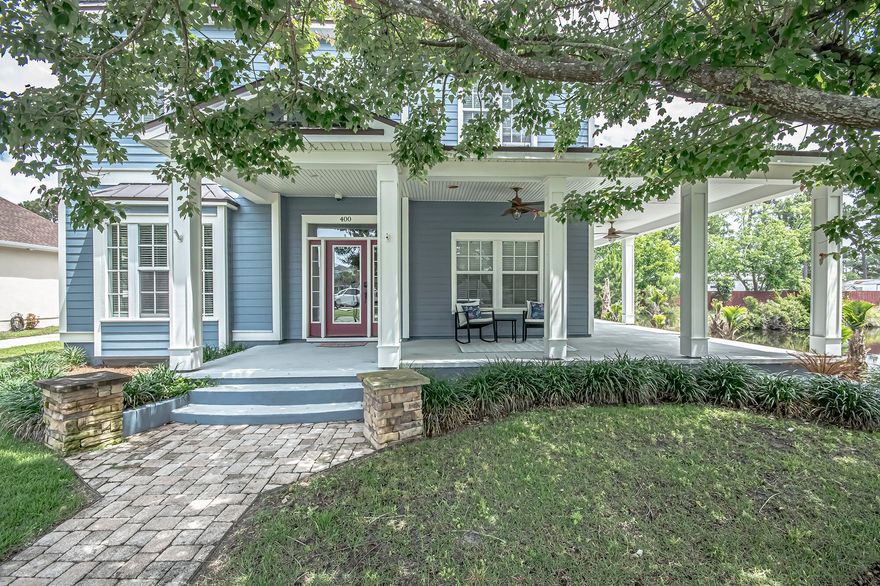 Welcome to 400 Liverepool Ave, a stunning, home located in the desirable Tapestry Park neighborhood. This meticulously cared for home includes HardiBoard siding and soffits, new roof, and impact glass storm-rated windows. A spacious kitchen accentuated by granite countertops, elegant freestanding tub and separate shower in the Master bath, Aside from the the immaculate interior charm on the exterior you will notice, a fountain enriched pond that enhances the outdoor entertaining area, lush landscaping like no other in Tapestry Park. This neighborhood provides amenities that include an inviting club house and swimming pool, tennis court, basketball court, green space, and a children's playground. The neighborhood is an ideal half mile bike ride to the beach or Holiday Golf Club. Pier Park and Frank Brown Park, which boast dining and recreation activities galore, are also convenient destinations within three miles. Hutchison Beach Elementary is just across Clara Ave. A superb home in a neighborhood with desirable amenities in a perfect location is attainable now!