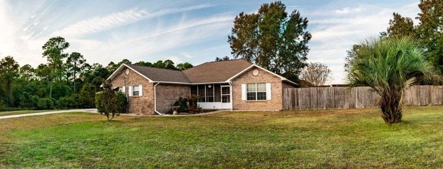 Welcome home to 7964 Sherry Ann Lane. Centrally located in beautiful Navarre Florida. This 1800 square foot home has 3 bedrooms and 2 full baths. Positioned on a corner lot on almost 1/2 acre adjacent to Navarre Intermediate School. Close to shopping, beaches and schools. Traffic light makes easy exit from the neighborhood on to Highway 98. The home has an open split floor plan and spacious bedrooms. Large laundry/storage room. Large eat in kitchen right off of the main living area. Built in fireplace. New HVAC system in 2014. Great air conditioned space off of the living room for kids to play or would make a great office. Large screened in porch overlooking the back yard. Privacy fence surrounding the property. One car garage plus a carport and lots of parking space.