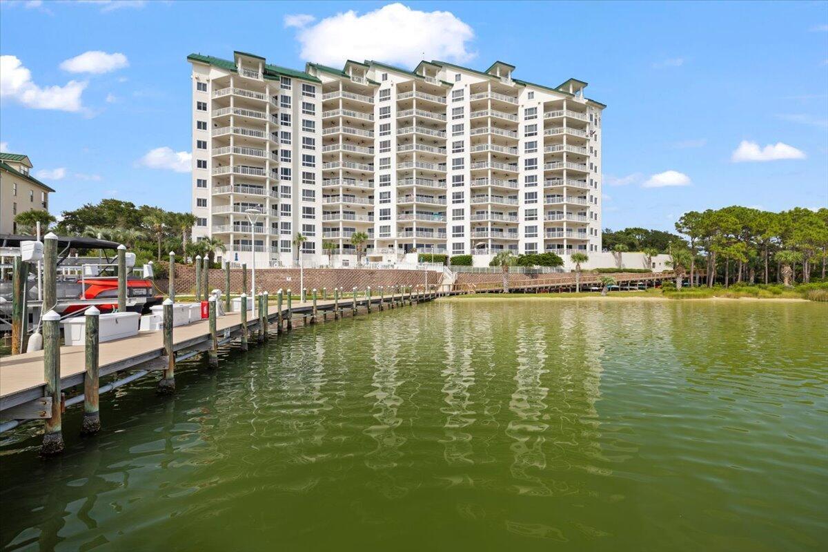 Welcome to your future slice of paradise! Nestled in the heart of Destin, this newly renovated, luxurious condo awaits a discerning buyer ready to indulge in elegance and exceptional amenities. Offering a sprawling 2,995 square feet of refined living space, this end-unit condo features four exquisite bedrooms, each with its own bathroom, updated for contemporary tastes. This gated and private community is an owners-only building, ensuring a sense of permanence and community. No revolving door of renters here; just neighbors becoming friends. Imagine waking up to breathtaking harbor views every morning, visible through expansive windows that invite natural light to dance across the 9.5-foot-high ceilings that run throughout the home. The primary bedroom is more than just a place.