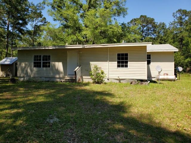 REO Real Estate Owned. A real jewel in a great location this is a very well priced 3 bedroom home on 5 ACRES this is a must see - - Hardwoodflooring, two extra rooms for your designation- built in tv area. Make an appointment for a private showing of this rare find. Located on a paved highway only 35minutes from the Beaches of South Walton. Home has 1716 square and a bonus room. This property may qualify for seller financing (Vendee).Call to take a lookat 520 Knox Hill Rd today.