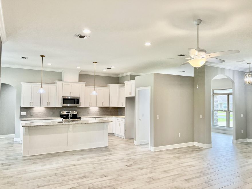 NEW CRAFTSMAN Custom Built Home in Holley By The Sea,Enjoying all the Club House amenities including :Pools,Fully Equipped Gym,Tennis Courts,Waterfront Park & Deeded Access to Santa Rosa Sound This luxurious 4 bed/3 bath Tri split floor plan is under construction...and will be ready in time for your late Fall move in  ~Great Location within HBTS..with easy access to Navarre Beach, shopping and Hwy 98 to Hurlburt Field AFB.This Stunning Robbins Builders Custom Home offers trend setting design & features~Greeted by a walk in foyer open to the Formal Dining and Office through to your open floor plan ~Large Gourmet kitchen enjoying shaker cabinets with crown molding ~ beautiful granite counter tops~Tiled Back splash~Under Mount Sink~S/S Appliances~Large wrap around walk in pantry ~Center Island with open flow to the breakfast nook and family room, Wood Plank staggered tile through the foyer,dining room, main living area, laundry and bathrooms. Large Master with trey ceiling & ceiling fan. Master bath offers a large tiled walk in shower /separate soaking tub~Granite double vanity with picture frame mirrors & Huge walk in closet.Two additional bedrooms are a great size with double closets~ ceiling fans and share a bathroom with a step in tub/shower ,linen closet and WC.Third additional bedroom is separate from the other rooms and would make a perfect guest/teen suite with its own bathroom and access out to the large covered porch.Laundry room & over sized 3 car garage ...ideal for the larger trucks and still plenty of room for all the outdoor toys. Home is situated on a large lot with grassed yard ~sprinkler system~ lawn pump and well with digital programmable timer for easy care. TAEXX in wall pest control system~ Fabric Shield Hurricane protection and dimensional shingle roof for lower insurance premium. Upgrades include crown molding, recessed lighting ,framed mirrors, deluxe lighting package,50 Gallon water heater, garage door remotes, attic drop down stairs~ to name a few......Call today for further information ,colors and construction status.** pictures are of previously closed homes so colors ,fixtures and finishes may vary .