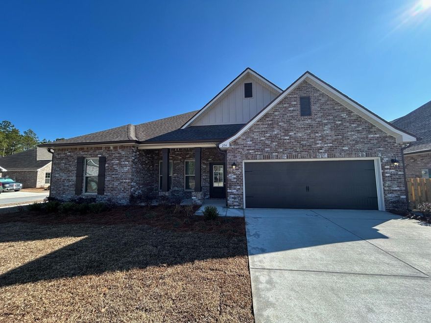 Located on a corner lot, the COMSTOCK III H in Bird Song at Hammock Bay community offers a 4BR/2BA, open design. Upgrades added (list attached). Features: double vanity, garden tub, separate custom tiled shower, and walk-in closet in master bath, double vanity in 2nd bath, kitchen island, walk-in pantry, walk-in closet in beds 2 and 3, boot bench in mudroom, covered porches, undermount sinks, custom kitchen backsplash, crown molding, LED lighting, smart connect WIFI thermostat, framed mirrors in all baths, landscaping package, architectural 30-year shingles, flood lights, and more! Energy Efficient Features: water heater, electric kitchen appliance package, vinyl low E windows, and more! Energy Star Partner.