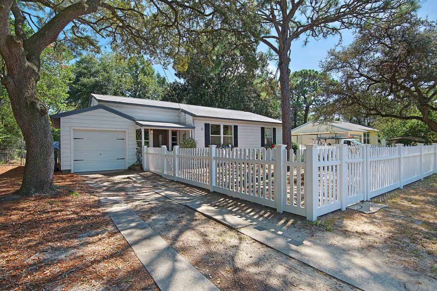 You have got to see this one!! Becauseit is Adorable, Affordable, Artsy, Comfy, Cozy, and has a Vintage feel on the inside with a Wonderful, Welcoming Courtyard and nicely sized fenced backyard.Click on the pictures and discover the many upgrades both inside and outside the home has that make it move in ready with the furnishings being negotiable due to the owners' relocation to their new destination.This home is conveniently located to the many amenities that the Southeast Quadrant of Fort Walton Beach has to offer. Be less than 4 minutes to the Sound, 6 minutes to the Beach, Pier, and Boardwalk, & only 12 minutes to Destin to enjoy the Harborwalk .Have a great place to live for the price, and come see this charming one of a kind home today!