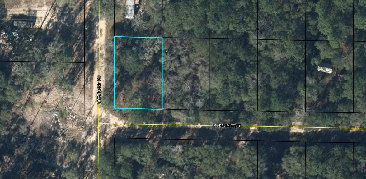 This is your chance to own a little river getaway! This lot is located on the west side of Bonifay, FL off Highway 179, just a few blocks away from the Choctawhatchee River & Boat Ramp Road public boat landing. This is the perfect place to get away and have easy access to as much fishing and river riding as you can possibly handle. There used to be a mobile home on the property. Therefore there is a septic tank on site. Although the seller is not sure of the condition of the septic system. Power is available at the street as well.