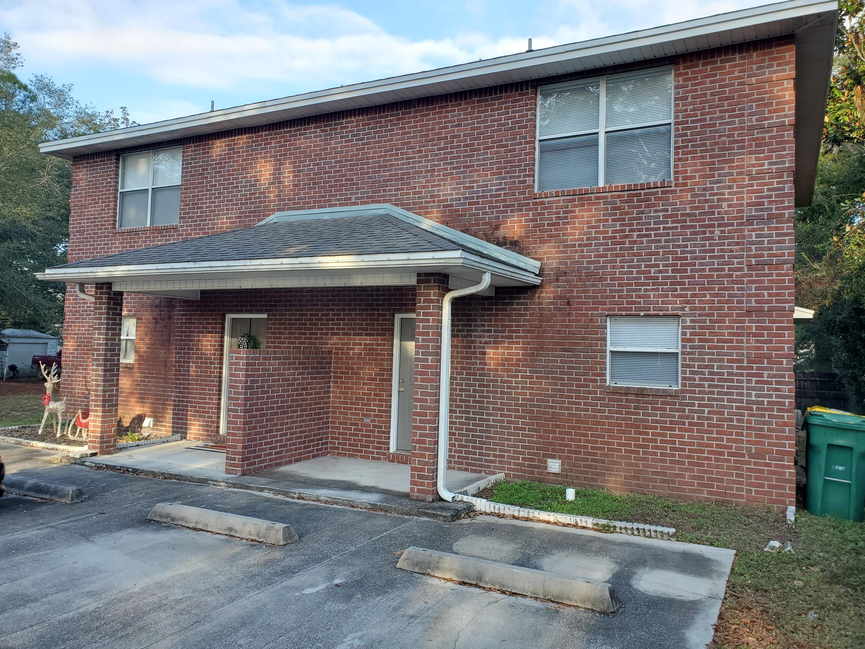 Spacious duplex townhome with cathedral ceilings in the dining/living area. All tile flooring downstairs with granite counters. This nice unit is within walking distance to Niceville HS and Ruckel Middle School. Covered patio in backyard and yard service is included! All Coastal Realty Services residents are enrolled in the Resident Benefits Package (RBP) which includes renters insurance, HVAC air filter delivery (for applicable properties) and our best-in-class resident rewards program, and much more! More details upon application. Sorry no pets.