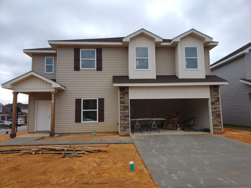 Another custom design by Award Winning Signature Builders. The Primrose is a four bedroom with two and a half baths. The office/ den could be converted to a bedroom. The master suite offers two spacious walk-in closets. Trayed ceiling and separate tub/shower.This spacious floor plan offers an open living area with kitchen, dining and living room flowing together. Energy features such as 14 seer heating and cooling system. Ridge vents for roof and attic ventilation. Low E glass in windows.