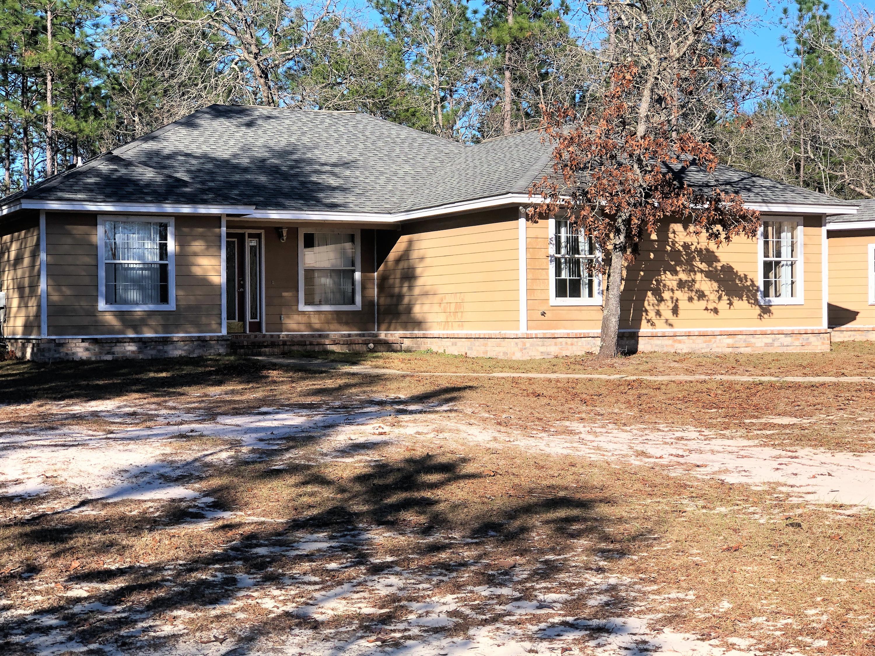REO - Wonderful, private setting located in North Crestview. Roll your sleeves up and get your new house back to pristine! This home has 5 bedrooms and 3 bathrooms. A large Family room and an attractive dining room. The home is attached to an unfinished breeze way that leads to the garage. A workshop is attached to the garage and is accessible from garage or outside entry. This home sits on a full acre on a semi private road with a private well system so you can be off the grid to enjoy the quietness of country living.This great home is the perfect candidate for a Renovation mortgage loan. Ask your Realtor about this home today!All measurements and areas important to buyer to be verified by buyer.