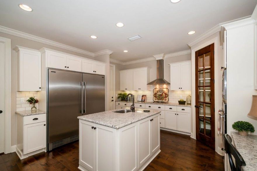 Pre-sold home. The Roush floor plan is 4 bed, office, 3 bath, 2.5 car garage home with a covered front porch, side lanai, and expansive covered rear porch. This home features chef's style kitchen, 100 year warranty Wood Harbor cabinets, chimney hood exhaust vent above the gas cooktop, pot filler, tiled back splash, built in oven and microwave and a built in refrigerator/freezer. Enhancements to the interior home include cased windows, crown molding, 8' doors and Mohawk Revwood Plus hard wood laminate floors. A master suite providing his and her walk in closets, a spa like soaking tub and large tiled walk-in shower with two shower heads. Enjoy the outdoors from both the front and rear porches overlooking the expansive landscaped yard.