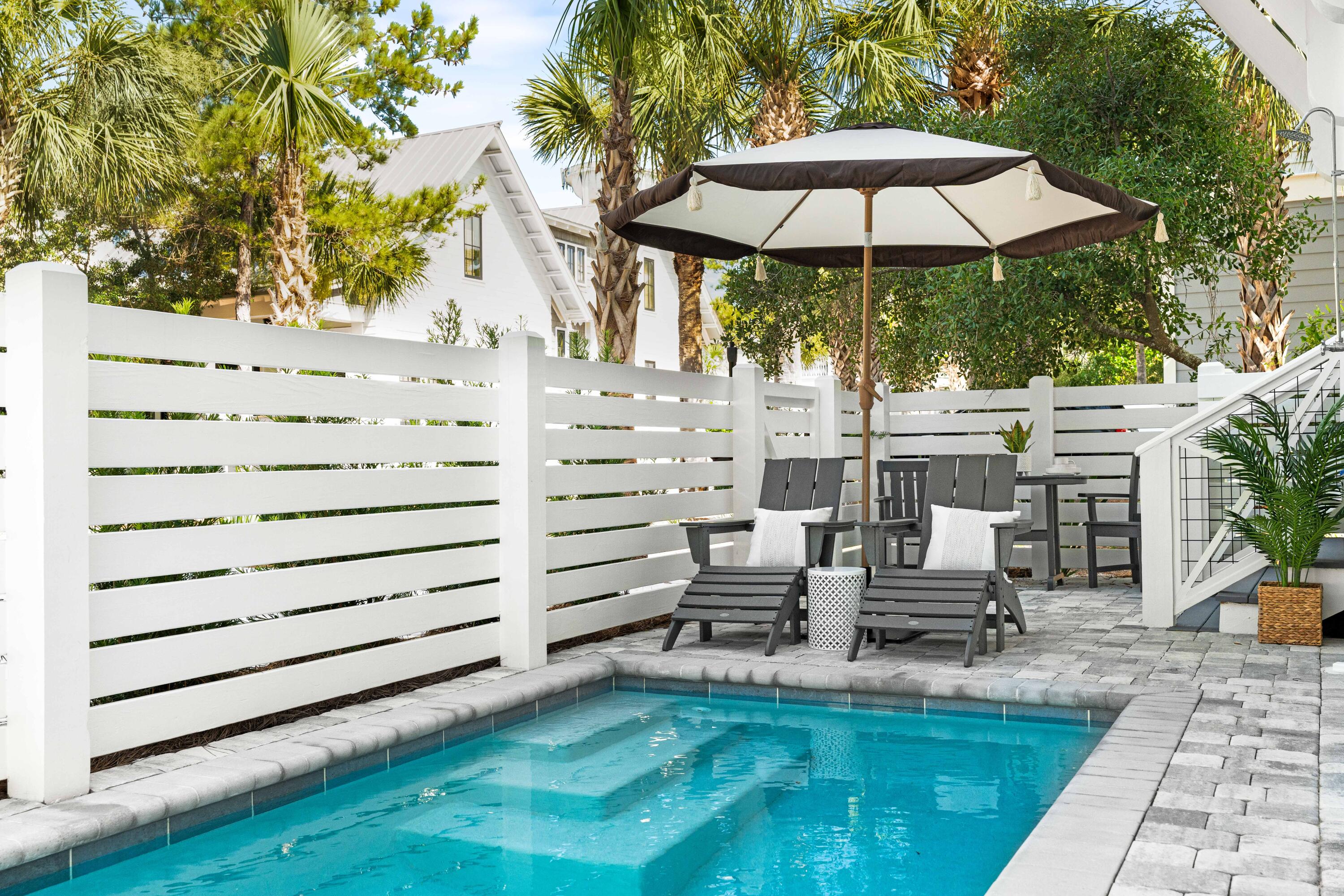 STUNNING! Just completed and easy show, NEW CONSTRUCTION home in Seacrest Beach with PRIVATE POOL! Custom-built 5 bedrooms, 6 bathrooms, with additional Flex Room and Media Room. Fully furnished and decorated, this spectacular 30A turnkey beach house is ready now for your family to enjoy! Never rented but rental-ready with all included linens, dishware, kitchenware, bedding and necessary vacation home supplies. Everything you need to hit the ground running!A bright and airy CHEF'S KITCHEN features a sizeable, quartz waterfall island, floating shelves, and Pro Grade appliances from SUBZERO and THERMADOR, including SUBZERO'S 48'' Pro Grade flagship refrigerator. Create memorable family dinners with the THERMADOR 48' Gas Range Cooktop with double oven! This kitchen is an entertainer's dream, with a separate Undercounter Ice Maker, Wine/Beverage Fridge, Drawer Microwave, cast iron Kohler farmhouse sink and additional prep sink.
Step out back to the private, 3,000-gallon, saltwater, GAS-HEATED dipping POOL, perfect for relaxing after a full day at the beach, and popular with rental vacationers!
The third floor is the entertainment center of the home, with a Media Room, Wet bar, Separate Ice Maker, Wine/Beveridge Fridge, spacious outdoor Covered Porch with seating and dining areas, and BUNK ROOM that sleeps 6!
Designed to be used as a vacation rental or second home, this new construction residence features real hardwood floors (not vinyl), generous closets, custom tile work, shiplap walls, a custom-built swing daybed on the primary bedroom covered porch, designer lighting and finishes throughout, as well as another inviting porch swing on the ground floor.
If utilized as a vacation rental property, 205 Seacrest Beach Blvd sleeps up to 16 guests, with its 5 bedrooms (each with a full bathroom), including a 3rd floor bunkroom which sleeps 6, and a 3rd floor media room for the kids. Additionally, the primary bedroom features a FLEX ROOM that can be used as an office, a nursery, or owner's lockout closet. On the second floor you will also find a FULL-SIZE laundry room, with deep sink, LG washer-dryer appliances and custom cabinetry for ample storage. Enjoy virtually instant hot water throughout the home with 2 large, tankless, gas water heaters. You and your guests will enjoy the 3-space driveway in the rear of the property, plus an additional parking space up front! SMART HOME features include 2 NEST camera doorbells on the front and back doors, 3 NEST Wifi-connected Thermostats, as well as WIFI connected Thermador Oven, Subzero Fridge and LG Washer Dryer.
More than 700 square feet of covered outdoor living porches invite the coastal breeze into this home and beckon you to relax outside. Spend time with family and friends on the WEST-FACING top floor covered porch and enjoy the breathtaking 30a sunsets.
Located between Rosemary Beach and Alys Beach, and just a few minutes' walk to fantastic restaurants, bars and boutique shopping, this new home is a perfect luxury second home or vacation rental property. Built by award-winning CHIMAR CONSTRUCTION, this home's builder warranty conveys with sale.
Seacrest Beach is a deeded, private-beach community on the thriving east end of 30A. A tram service is provided throughout the Seacrest Beach neighborhood so you can quickly and easily arrive at the white pristine private beaches and beautiful waters of the Gulf of Mexico. And just a short stroll to the largest pool on the east end of 30A, Seacrest Beach's 12,000-sq.-ft., community pool. Seacrest Beach is a vacation favorite with palm-lined streets and nature trails near the world-class dining and shopping that Scenic Highway 30A is known for!