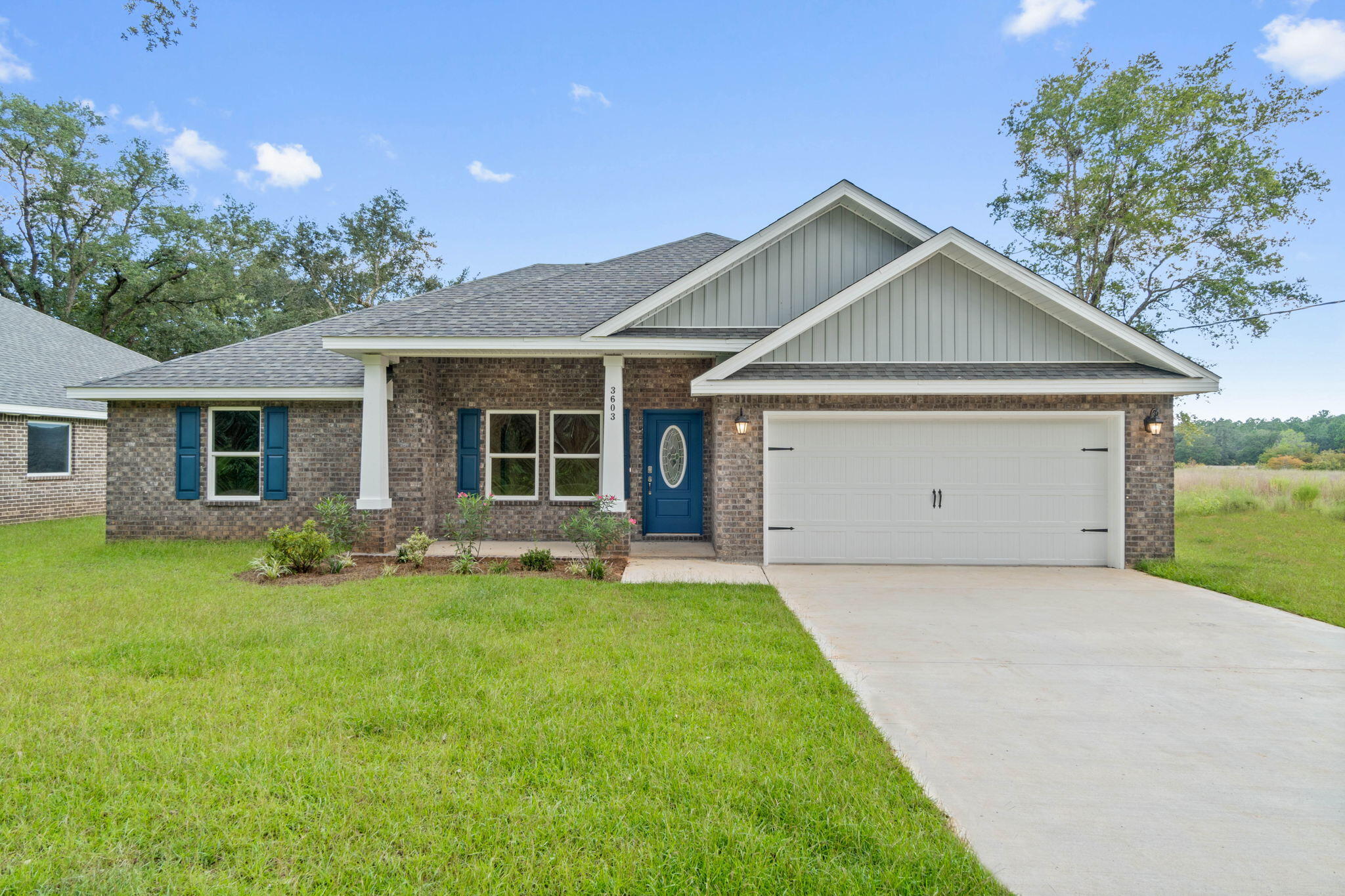 Welcome to the 'Sunburst' Floorplan. This exquisite 3 bedroom, 2 bath brick home offers modern living with a spacious, open, split floor plan, featuring large vaulted ceilings, crown molding, and 2'' faux wood blinds. The open layout seamlessly connects the kitchen to the living and dining areas, making it perfect for entertaining. The kitchen is a chef's dream with stainless steel appliances, granite or quartz countertops, bar seating, a full pantry, and solid wood soft-close cabinets and drawers, all elegantly detailed with brushed nickel hardware. The grand master suite features a luxurious master bathroom designed for relaxation, complete with a garden tub, a separate all-tiled shower with dual shower heads, double vanities, and two large walk-in closets. Enjoy the .34-acre lot in peace with a full backyard privacy fence, providing ample space for outdoor activities and relaxation. Situated in a highly desirable new subdivision south of I-10, just off Hwy 87, this home offers easy access to both Navarre and Milton. Additionally, you'll be just 20 minutes away from the pristine white sands of Navarre Beach, making coastal living a breeze. Photos are of a similar home; colors and selections may vary. Don't miss out on the opportunity to own this beautiful new home!