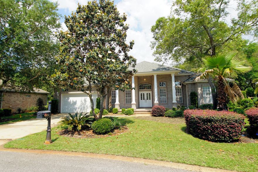 Enter this beautiful and spacious 4 bedroom, 3 full baths, 3200 sf home through a 250 sf front porch with four columns that provides incredible curb appeal. Also located in a gated community. The home offers attractive arches and columns in living areas. Split bedroom floor plan with special attention to bathrooms and storage space design. Soaring 13 ft high living and dining rooms with tray ceilings and recessed lighting. The master has tray ceiling and recessed lighting, and a separate sitting area that can be used as a study. His & Her built in laundry hampers in the master bath. The beautiful open kitchen has granite counters and cabinets galore. Brand new stainless steel appliances, rope and under cabinet lighting. The spacious dinette has its own buffet and built-in lighted cabinets. The family room has built-in entertainment wall and cabinets, and a hassle-free electric fireplace. There is also an open bonus area adjoining family room, which can be used as a game room. The florida room has cathedral ceiling and is wired for speakers. This home is a must see! Great neighborhood for security.