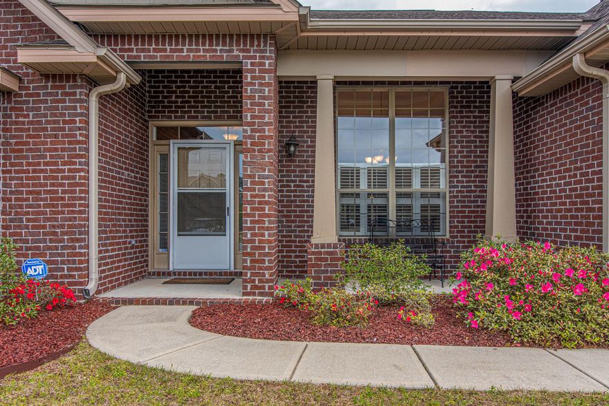 The perfect place to call home! Meticulously maintained brick home where you can relax on your custom oversize trex decking for cookouts and gatherings.This elegant home features 3 bedrooms 2 baths, office and a formal dining room with box trey ceiling.The large chef's kitchen is not only beautiful with granite counters and trendy back splash but it is also functional with plentiful sized cabinets and pantry. Equally as impressive is the master suite with tray ceiling that's connected to the master bathroom with double vanities, tiled shower, walk in closet and jetted soaking tub. Beautiful mahogany wood floors in main living areas and new carpeting in all the bedrooms.Washer/dryer, ,screened in lanai and private backyard makes this the perfect home!