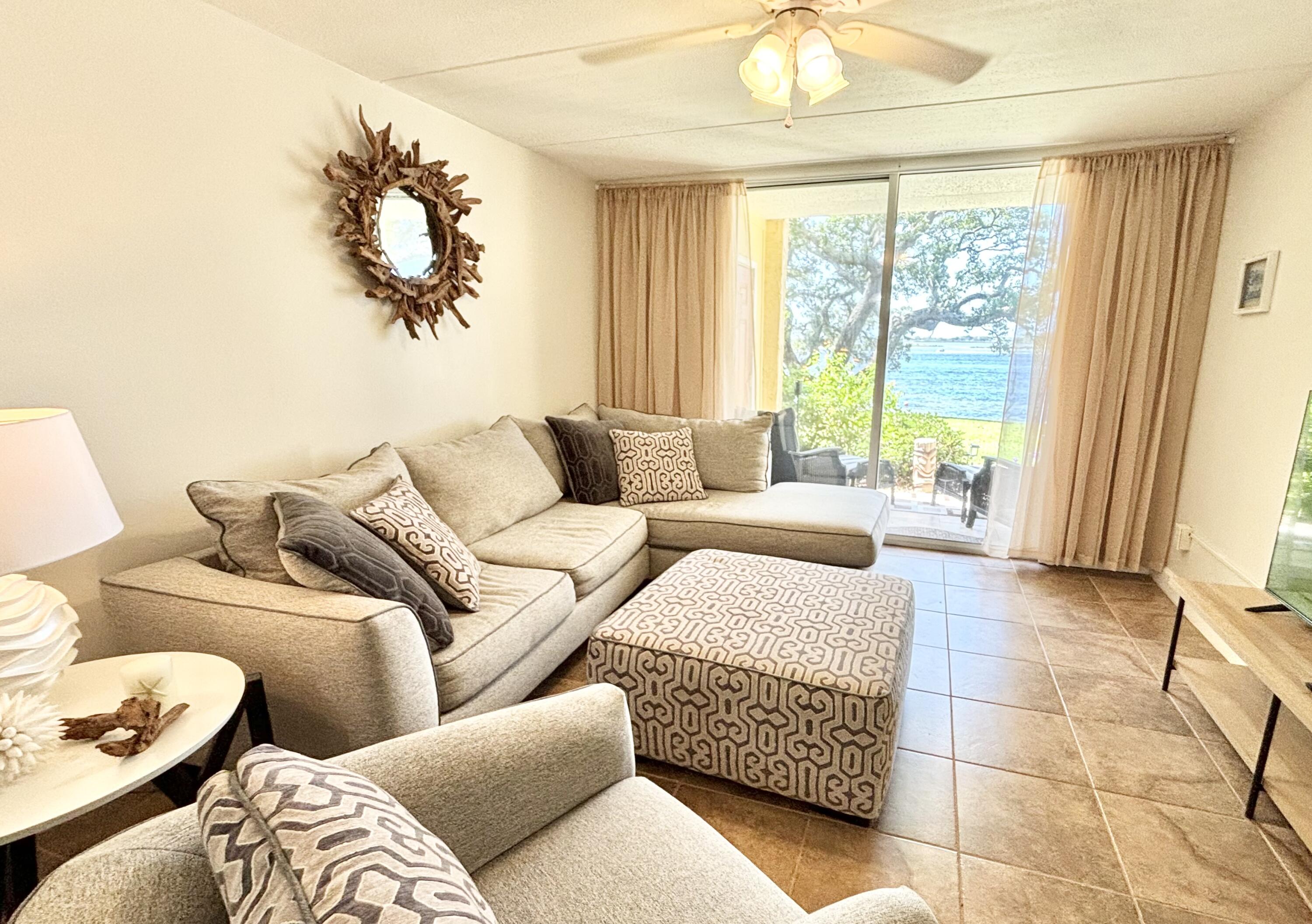 Waterfront - see dolphins from your livingroom ! Spacious two bedroom condo overlooking Okaloosa Island, and white sand beaches islands in the sound. Park like grounds with fishing dock, ingroud pool and kayak storage. Move in or use as vacation rental, short term rental or long term rental. Crab Island is 20 min by boat, Destin Harbor is 7 miles away ! Coastal life is within reach.
