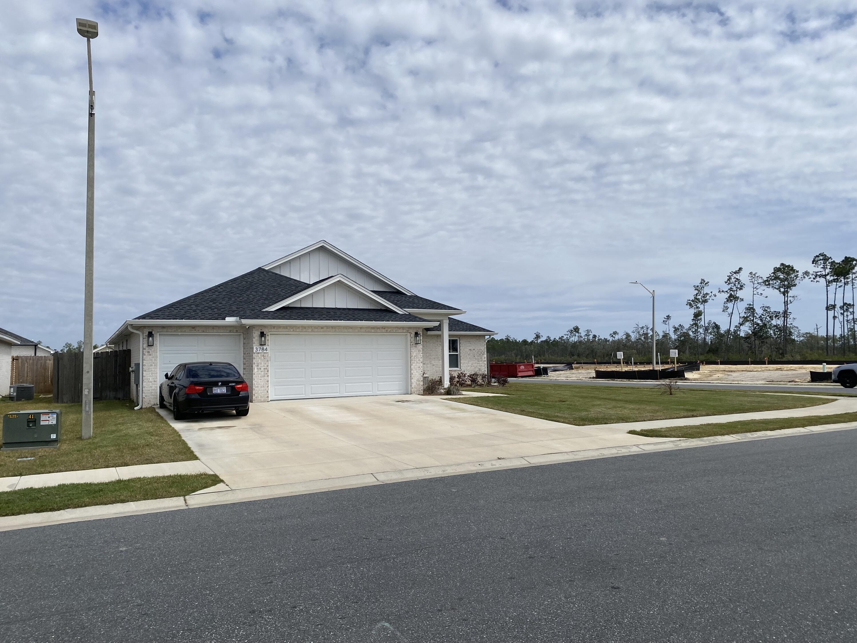 THIS IS THE DEAL YOU HAVE BEEN WAITING FOR! THE SELLERS ARE MOTIVATED TO MAKE A DEAL! The moment you close you will have a great amount of equity at this price. the home is worth more in the mid 400's. Sellers are ready for a contract THIS WEEKEND! A 5-bedroom 2 bath split floor plan Contemporary home immaculately kept. Sits on a CORNER lot with New Privacy fenced in back yard. Sturdily built, up to today's code by Camden Builders. Three entrance ways in through the privacy fence. Light colored brick enhances the home with teal front door, cute curb appeal thick Zoysia grass and fresh flowered front gardens accented with black mulch. Water system complete with irrigation meter and backflow installed to save money on water bill. Irrigation system with control panel. New gutters installed with front covered entrance way and back covered patio make for easy rain free entrances. There is a Schlage keypad on front door. Keypad entry for garage, security system has been installed. Security system has cameras in the driveway and that security system can be controlled from a phone as well and a ring doorbell with camera. Once inside enjoy the High ceilings, open concept living room, dining room, sitting room and gorgeous modern kitchen featuring Quartz counter-tops, LG stainless top of the line appliances, stainless-steel single basin sink which is extra-long and features 5 burner stove with warming zone. The stove has ThingQ which means you can control settings and features from your phone. All house window treatment installed top down, bottom up, cordless cellular light filtering blinds throughout the home. Large laundry room right off the kitchen with areas of storage and a 3-car garage. Home has Trey ceilings in Living room, master bedroom with beautiful modern lighting and ceiling fans. You will love the Master bathroom equipped with Huge walk-in tiled shower, his-n-her sinks, deep separate tub and large walk-in closet. Wide plank luxury vinyl plank flooring for easy maintenance. Bring your toothbrushes, clothes and make family memories in this beautiful home. Very close to 23rd street and all it has to offer! Make your personal viewing appointment today! Buyer and buyer's agent to verify all dimensions and anything deemed important