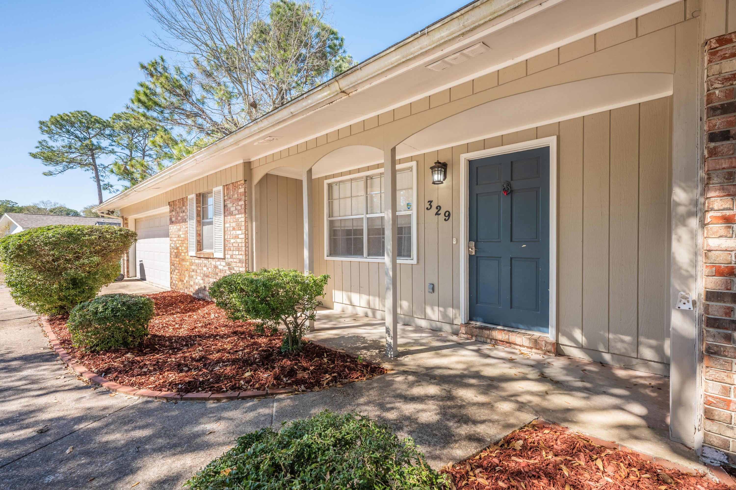 Updated three bedroom two bath in Northgate NeighborhoodThis brick and wood exterior home is located in the Northgate neighborhood of Ft. Walton Beach. A covered front porch makes the perfect place for rocking chairs and a small table, or colorful potted plants. Inside you'll find wood laminate flooring throughout all common areas, with tile in the kitchen and both baths, as well as carpet in the bedrooms. This home has updates to include crown molding and recessed lighting in the living, kitchen and dining areas, as well as ceiling fans in all of the bedrooms. The kitchen is outfitted with all stainless steel appliances, a ceramic cooktop stove, tile backsplash, and beautiful concrete countertops!