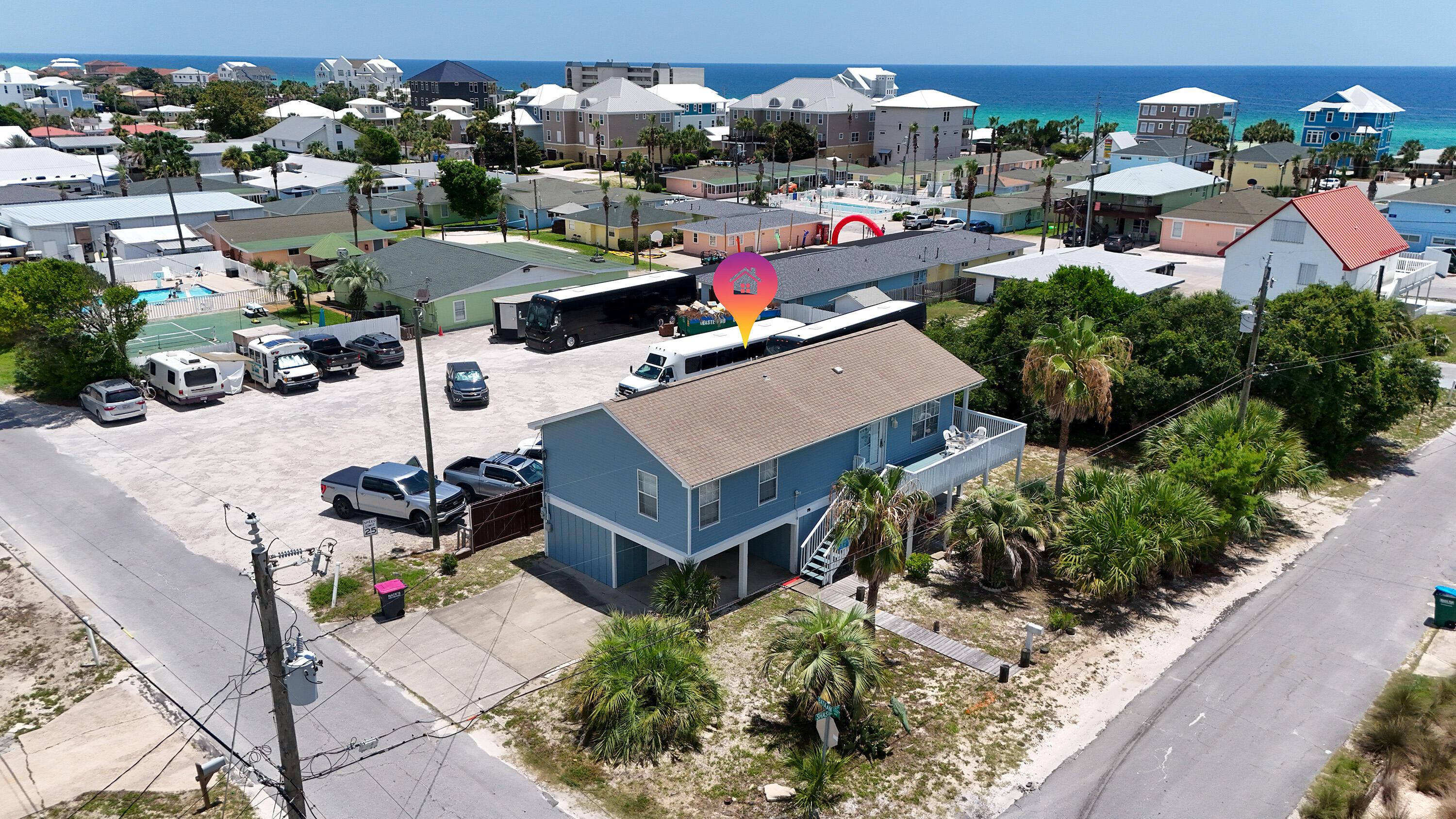 Located less than 500 feet from Beach Access 92 on the desirable west end of Panama City Beach, this home features peek-a-boo views of the Gulf from the dining room and deck. Only 3 miles from 30A, this property gives easy access to the beach without the private beach issue. The home features 3 bedrooms and 2 baths upstairs and a studio/bonus area underneath with full bath and kitchen. Large lot and access to city sewer allows possibility of pool. Plenty of storage space on lower level with 17'x12' enclosed and lockable storeroom for all your beach and recreational equipment. New exterior paint last year and new AC unit in 2024. Roof was replaced in 2016. Home is currently being used as a Short Term Rental.
