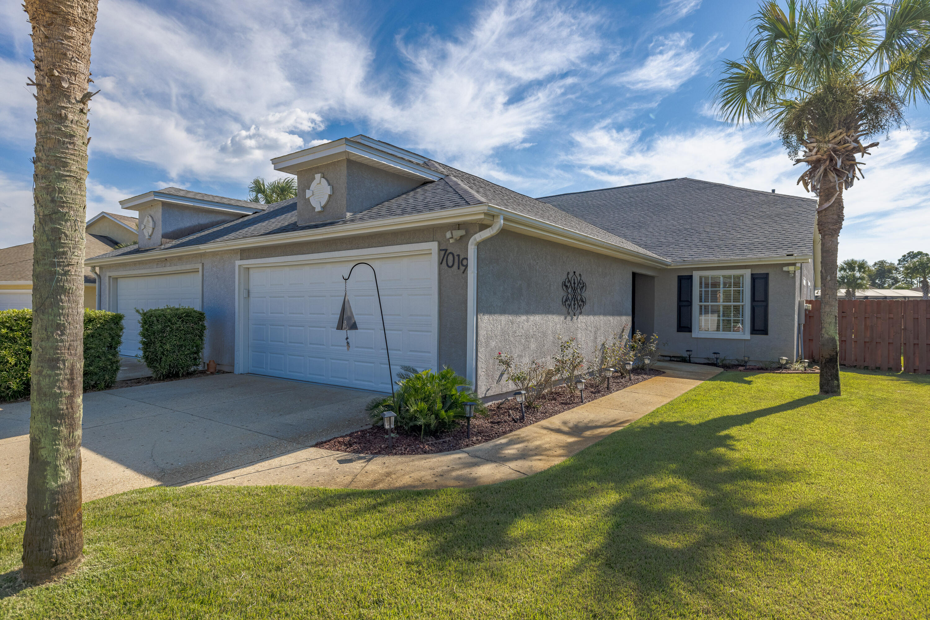 Discover this wonderful one-level townhome in the gated, waterfront community of Dolphin Bay. This beautifully updated home features an open floor plan, perfect for entertaining, with sliders leading to a spacious extended patio and a generous backyard--ready for a pool! The modern kitchen boasts quartz countertops, while recent upgrades include a new roof and HVAC system (both just 2 years old) and a brand-new tankless water heater. Enjoy ultimate privacy with a fully fenced backyard and an additional private fenced area. Dolphin Bay offers more than just a great home--it's a lifestyle. With low HOA fees of only $360 a quarter, residents have access to a private marina, boat storage, tennis courts, a picnic area, and a dock. SEE ADD REMARKS FOR FULL DESCRIPTION Conveniently located near the Navy Base, local restaurants, and just a short drive to Pier Park and our gorgeous beaches. Don't miss out on this rare opportunity to live in one of the area's most desirable communities!