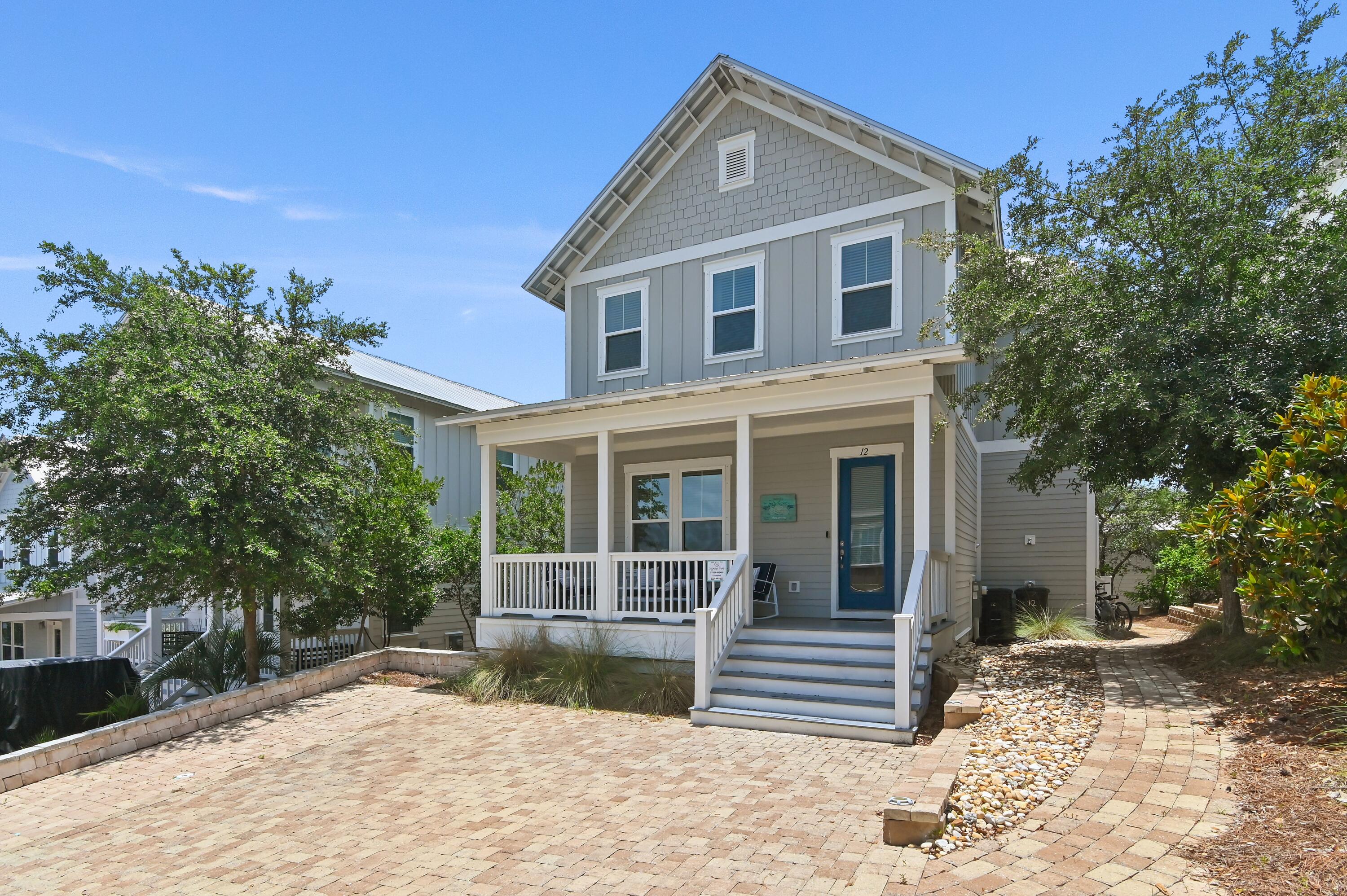 Just minutes from the sugar-white sands and vibrant local favorites of Blue Mountain Beach, this fully furnished 4-bedroom, 3-bathroom retreat offers the ideal blend of laid-back luxury and everyday convenience. With plenty of thoughtfully designed living space, the open-concept floor plan features hardwood floors, a spacious kitchen, and a seamless flow between living and dining areas--ideal for relaxed entertaining. A main-floor bedroom and full bath offer added flexibility, while the expansive upstairs primary suite provides a peaceful retreat, complemented by two additional guest rooms. Enjoy coastal breezes from the large front and rear porches, or take a quick stroll to the beach. The Highland Parks community offers resort-style amenities including a resort pool, hot tub, fire pit, outdoor kitchen, and a signature 4-story lookout tower with panoramic sunset views. With an oversized parking area and turnkey readiness, this home is perfect as a vacation rental, second home, or full-time residence by the best of 30A's dining, shopping, and entertainment.