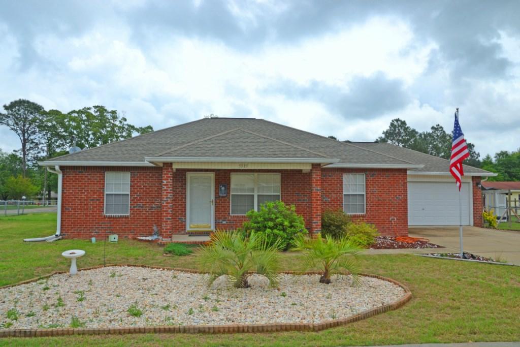 MOVE-IN READY home, conveniently located to many amenities! Plus the Seller is offering a 1 Year HOME WARRANTY, and offering to pay MOST of your CLOSING COSTS! This easy to maintain brick and vinyl home, located on a corner lot, has a fenced back yard with a yard building to store all your outdoor tools, and a covered deck for your enjoyment! Popular Split Bedroom floor plan, has a fully equipped, ceramic tile Kitchen with all Appliances, Pantry, & tiled Dining area. The Living Room w/Cathedral Ceiling & Den offer plenty of space to entertain and enjoy your home! All bedrooms are carpeted & have ceiling fans. The Master Bedroom is located off the Living room and has a large walk-in-closet in the Master Bath. Schedule your showing today!