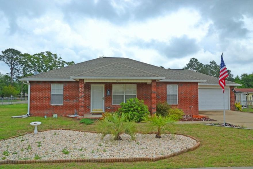 MOVE-IN READY home, conveniently located to many amenities! Plus the Seller is offering a 1 Year HOME WARRANTY, and offering to pay MOST of your CLOSING COSTS! This easy to maintain brick and vinyl home, located on a corner lot, has a fenced back yard with a yard building to store all your outdoor tools, and a covered deck for your enjoyment! Popular Split Bedroom floor plan, has a fully equipped, ceramic tile Kitchen with all Appliances, Pantry, & tiled Dining area. The Living Room w/Cathedral Ceiling & Den offer plenty of space to entertain and enjoy your home! All bedrooms are carpeted & have ceiling fans. The Master Bedroom is located off the Living room and has a large walk-in-closet in the Master Bath. Schedule your showing today!