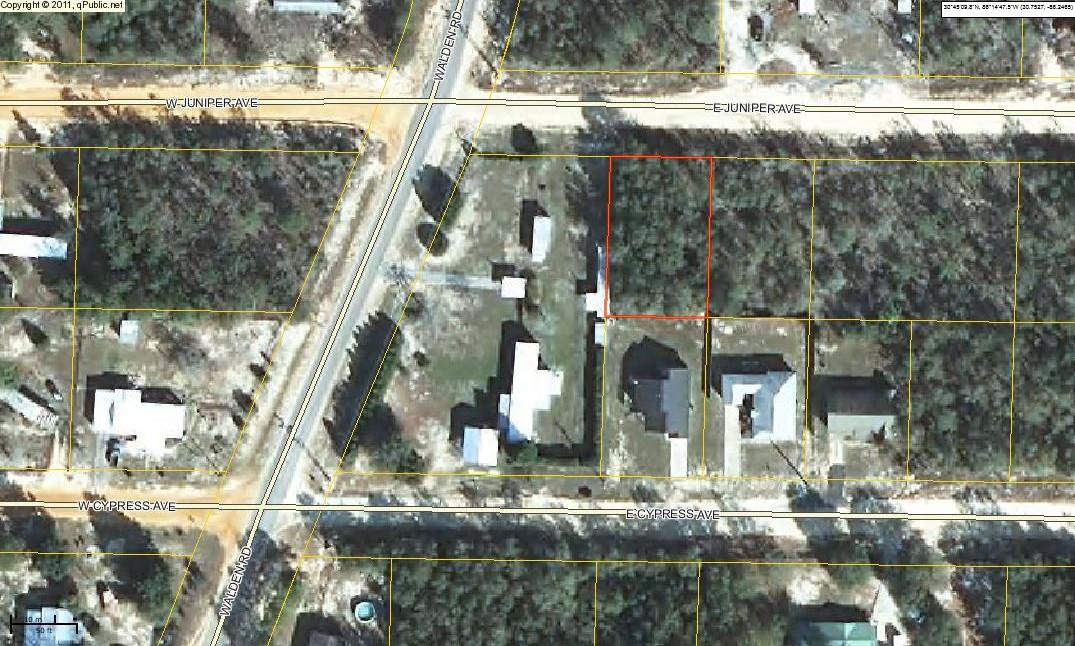 Apx. 1/4 acre lot just off paved rd. in growing Mossy Head.