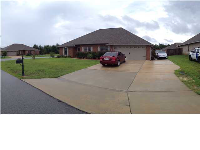 **AVAILABLE June 1** This wonderful home was built by Cassady Homes and is their ''Bessie'' floor plan, a 2,100 square foot all brick home in Lee Farm conveniently located in western Crestview allowing quick access to shopping and dining as well as convenient access to Duke Field, 7th Special Forces Compound, Hurlburt Field and Eglin Air Force Base. This home sits on a CORNER level lot that is fully sodded and landscaped with the large backyard enclosed by a privacy fence. This four bedroom/ two bath home has laminate wood flooring throughout with ceramic tile in wet areas. Nine foot ceilings, graced with beautiful crown moulding, in the main living area along with the open floor plan allow for a more spacious feel. This kitchen comes stocked with all stainless-steel appliances.