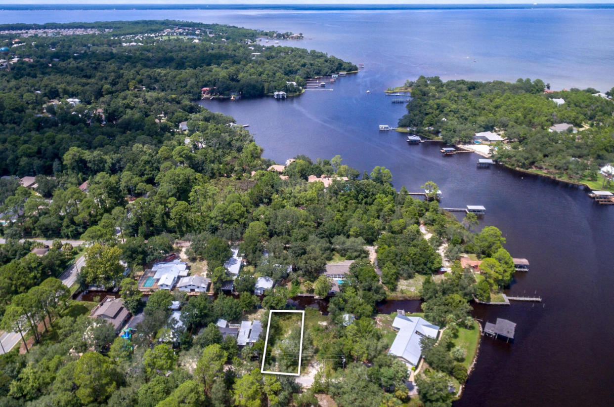 Nice canal front lot feeding into Mack Bayou. Easy access into the Hogtown Bayou and the Choctawhatchee Bay from Mack Bayou. Very convenient location close to Sacred Heart Hospital, Grand Boulevard, Topsail Hill Park, and the west end of 30A public beach accesses.