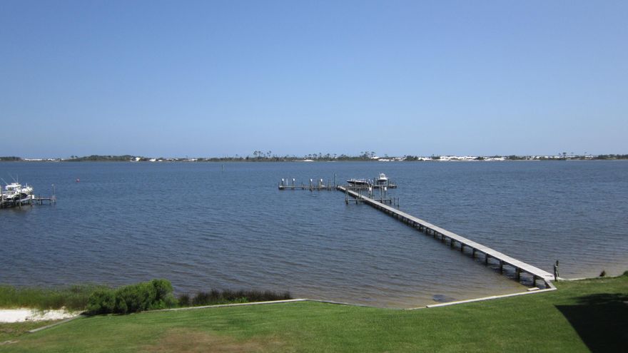 Million dollar view and move-in ready! End unit with an amazing unobstructed view of the sound. New Bamboo flooring in entry way, tile flooring in great room, kitchen and baths with new carpeting in all 3 bedrooms. Newly painted throughout plus stainless appliances in kitchen. All assessments (new plumbing, structural improvements and exterior painting) totaling $9600 have been paid in full by the seller. Unit offers built in desk and shelving in Master bedroom along with a huge walk-in closet and pull down storage. There is also custom shelving in the great room. Currently one boat slip available on a first come first serve basis for rent at $150 per year. Don't let this one get away! Seller to offer Home Warranty.