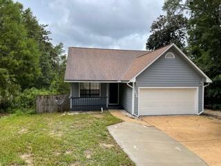 Comfortable 3 bedroom, 2 full bath home in the center of Niceville. Close to everything, schools, airport, shopping, medical services, Northwest Florida State College, Eglin AFB and Destin's world class beaches. Complete interior renovation: new vinyl plank flooring throughout, new paint, new bath vanities/counters/lights/mirrors and toilets, new living area fan, new window treatments, new nickel door handles, new kitchen counter, new cabinet doors and new stainless steel sink. Screened in porch over looking large back yard facing Turkey Creek area. Above garage storage. Steel reinforced garage door. Basement area storage potential. New hot water heater and HVAC in 2021. A smart buy for owner occupant or investor.