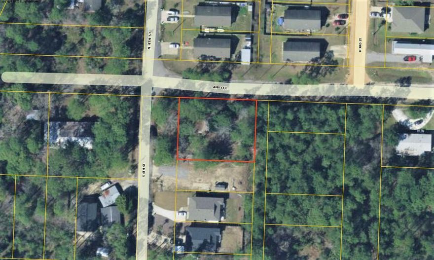 This is a corner double lot. There is a structure with fencing on the property, but it has no value and is not habitable. Good property for rental housing or first time homebuyer.