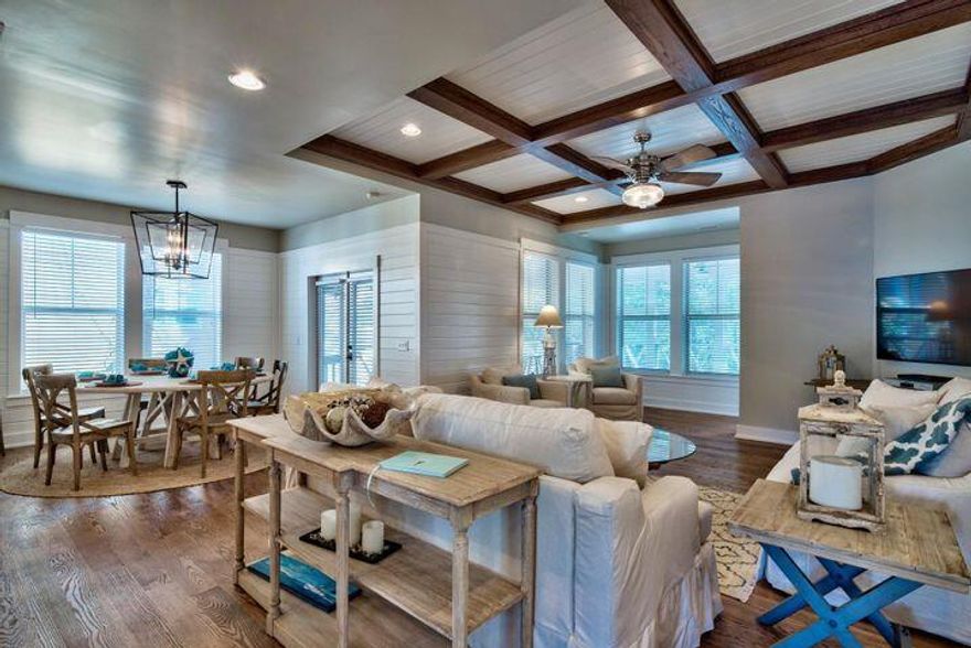 Welcome to this charming beach house located in stunning Seacrest Beach!  Light, bright, airy and stylishly decorated, this 4 bedroom 3 and a half bath home has room for the entire family and is being sold fully furnished and rental ready. The open kitchen/dining area has a custom kitchen with stainless appliances, Corian countertops and a designer backsplash tile that give a 'beachy feel'. The dining area has abundant seating for gathering, cooking, and talking about the memories of the day at the beach. The master suite is located on the first floor with a spacious master bath, garden tub and tiled shower.  A spacious balcony just off the upstairs bedrooms offer additional outdoor space. Custom built in bunks are in the 3rd upstairs bedroom. The HVAC and washer/dryer are new in 2021.