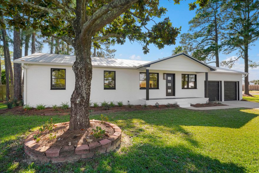 This STUNNING NEWLY RENOVATED 3 bed 2 bath, modern decor home (move-in ready) offers a rare opportunity to own in DESTIN- Miramar Beach across the street from the bay with pool. Enjoy the large open concept with great flow. The beautiful kitchen consist of Quartz Countertops coupled NEW black stainless appliances. Located in a quiet friendly neighborhood close to school, restaurants, and shopping. Huge corner lot boasting giant pines, swimming pool, room to expand, all directly across from the bay! (Dimensions) bonus room with fireplace not included in square footage. Start living your best Destin life today!