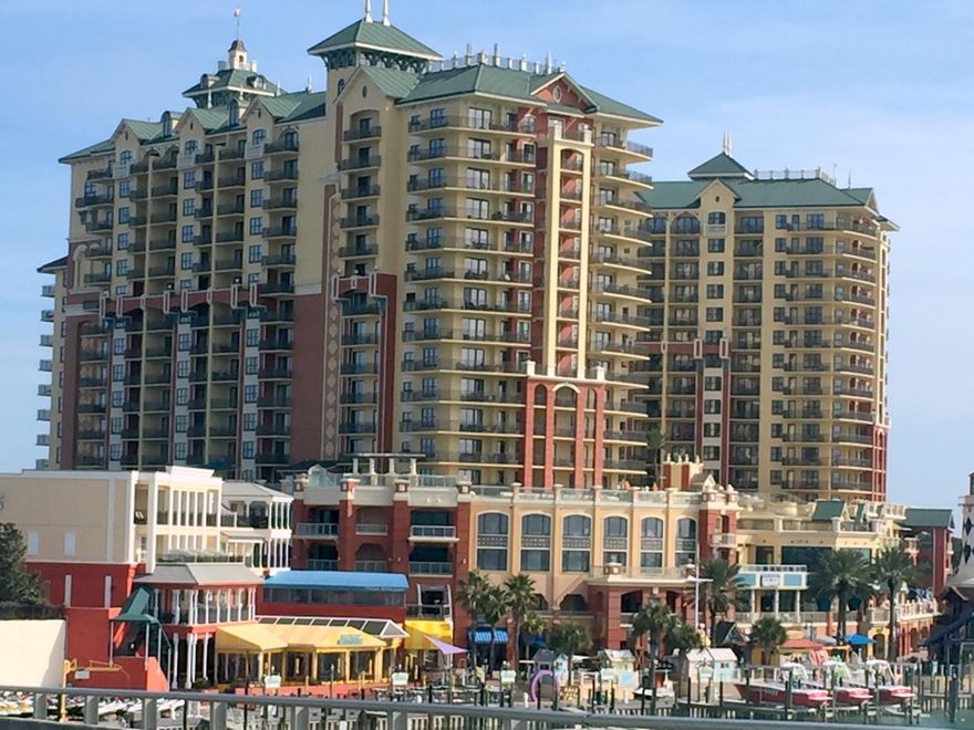 REO ~ Welcome to Paradise! Enjoy spectacular views of Destin's Harbor, East Pass, Destin Bridge & the Gulf of Mexico all from your 3 Bd / 3 Ba unit at Emerald Grande. Interior amenities include an open floor plan, crown molding, kitchen with granite counter tops & stainless appliances. The master bedroom offers water views & balcony access. The master bath offers double vanities, separate shower & garden tub. Emerald Grande offers the finest amenities which include on-site lobby, 500-square foot pool, spa & fitness center, restaurants & lounges, concierge services, covered parking, two marinas, room service, private boat to beach, kid's club, hot tubs, business center with high-speed wireless internet, & indoor heated pool.