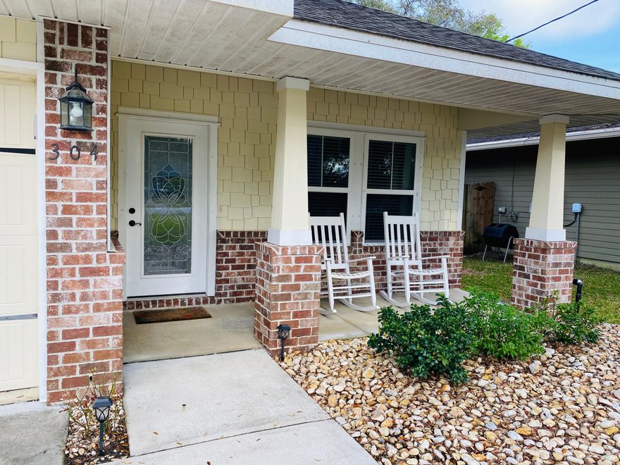 Great four bedroom home, just minutes away from your favorites places in Niceville.  This newer homes boast an open floor plan with high 9 feet ceilings through out the main living areas, tiles in living room and hallway, a granite kitchen tops, chef's delight kitchen, newer appliances with and oversize fridge, and pantry/laundry room separately.  Lots of maple cabinetry with crown molding in LRM, Kitchen and MB. Plenty of storage space There is a screened FL room, and a large size yard.  Lot is 50' x 150'.  The yard is landscaped all the way around with city water run automatic irrigation system. Numerous fruit trees and grapes planted on both sides and a small garden on the back yard.   Neat as a pin with 2' faux blinds. There is a jacuzzi tub, a standing shower and double vanity in the master bedroom with a separate shower and walk-in closets.  On hand custom made easy to install hurricane plywood shutters for all windows.