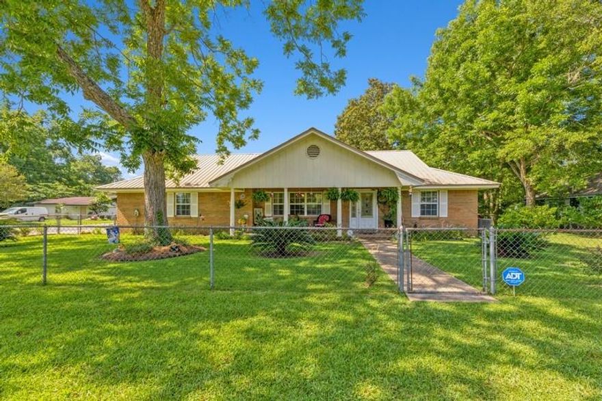 Well kept ranch home in the heart of Baker.  Home has 2 bedrooms and 2 bathrooms.  Kitchen has been updated with new cabinets.  Large heated and cooled Florida room could be used as a 3rd bedroom if the buyer needs the extra space.  Home has a metal roof and fenced in back yard.  There is a large detached shop in the backyard with attached carport.  Shop is even wired for electricity.  Make an appointment to see this one today.  It won't last long.