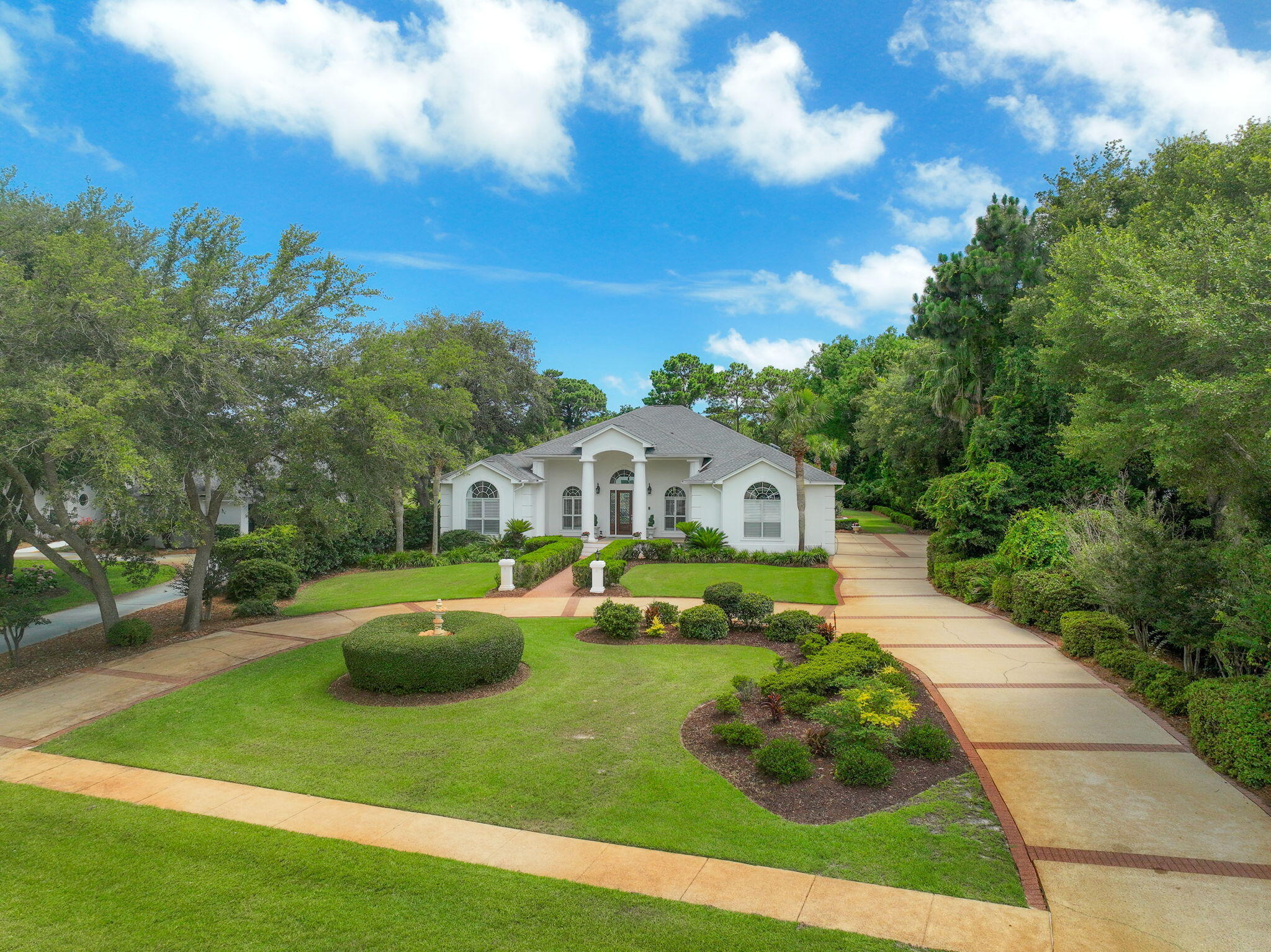 Don't Miss this Rare Opportunity to own one of Indian Bayou's finest homes -- where luxury, privacy, and an unbeatable location come together. Discover an exceptional residence perfectly situated on an estate-sized golf course lot in the prestigious Indian Bayou community of Destin. Meticulously updated with over $200,000 in recent improvements, this home blends timeless elegance with modern comfort, featuring a new roof, updated HVAC, fully replastered pool with new pump, and a stunning master bath renovation. Designed for effortless entertaining, the expansive open floor plan is highlighted by soaring 16-foot ceilings, a full wet bar, and seamless transitions to the outdoor living spaces. Multiple rooms open directly to the screened lanai, where a large resort-style pool overlooks sweeping views of the golf course, offering a private oasis for gatherings and relaxation. The gourmet kitchen is a chef's dream, showcasing Monogram appliances, a gas cooktop, center island with breakfast bar, cozy breakfast nook, two pantries, and an impressive butler's pantry. Additional features include a spacious 3-car garage, oversized laundry room, and thoughtfully designed living spaces that exude both sophistication and functionality.