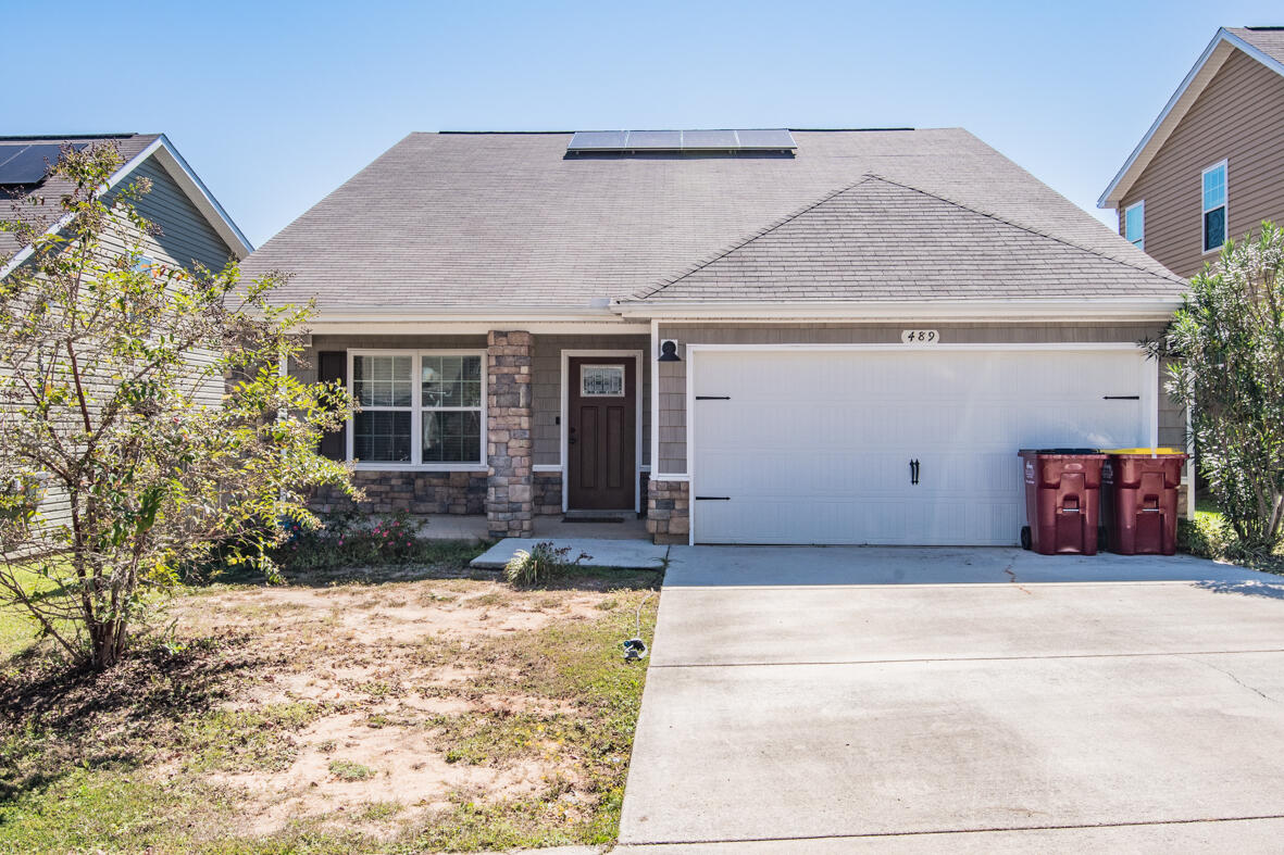 Price Improvement........move in ready...Solar subsidy and lawn care included in the rental rate......4 bedroom, 2.5 bathroom and a FLEX space that can be used for gaming, an office, playroom and more awesome. Located in the heart of Crestview and minutes to shopping, schools, bases and beaches. Lawn care is included as well with the HOA. The master bedroom is on the 1st floor with the 3 additional bedrooms and flex space upstairs. Open concept living, large kitchen with breakfast bar. 1/2-bathroom downstairs for guests. Fenced back yard, 2 car garage and much more. Double vanities in both bathrooms and plenty of room. This is a must see for the money. No inside smoking or vaping. Pets allowed with approval. Fenced back yard.