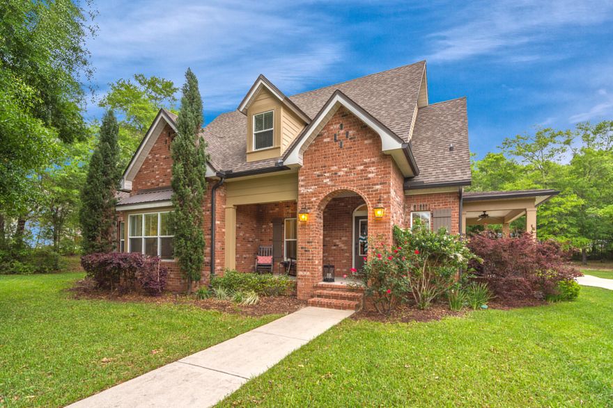 MILL CREEK FARMS!! Simply perfection like the pages of Southern Living Magazine! Check out this stunning 4 bd/2.5 ba home situated on a double lot totaling approximately 1.02 acres...you won't be disappointed! Inviting front porch and beautiful entry, grand open floor space, beautiful white cabinetry, stainless steel appliances and breakfast bar. Master suite is located on the first floor w/ two closets (1 is a large walk-in), dual vanities, garden tub and separate shower, Nice mudroom room and small bonus area great for shoes/backpacks or a small desk. Upstairs you will find the additional bedrooms (all a good size) and a full bathroom. The home has a great side porch as well and an attached 2 car garage in addition to the 2 car detached garage/workshop. SEE SUPPLEMENT