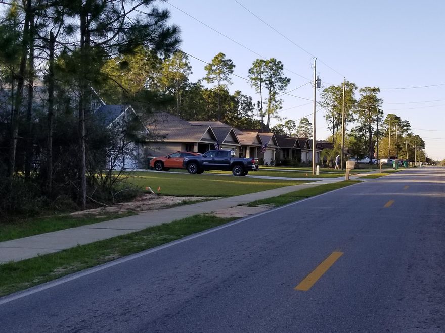 Great location, just under 1/2 acre. On a street full of newer homes just waiting for you to build your new home. About 2 miles from Navarre High school, 1 mile from Publix and just 10 minutes from the beautiful Gulf of Mexico.