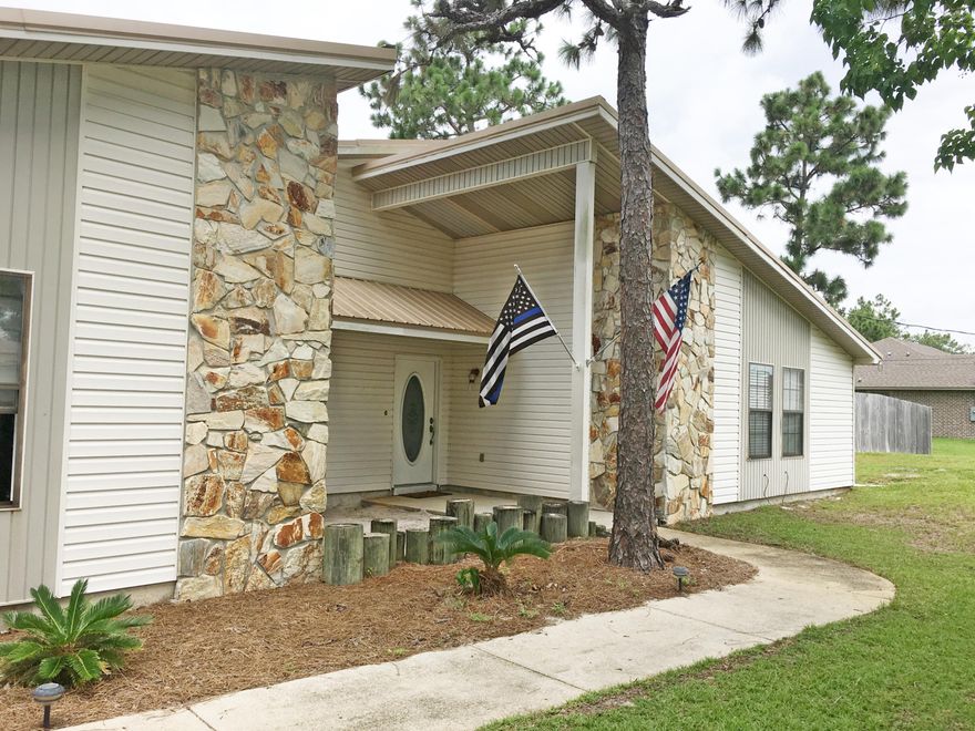 HURRY!!!... Holley by the Sea under $170,000!!! How Cute is this!! Large Corner LOT with Boat / RV Parking Access in Backyard!~ 3 Bedroom / 2 Bath Home with 147 sq ft LOFT! Home Features: 2004 Metal Roof / 2011 AC / 2017 Hot Water Heater / Fireplace / Vaulted Ceiling / Large Bedrooms / Lawn Pump / Side Entry 2 Car Garage / Garage Door Opener / Hurricane Rated Garage Door / 2 Kitchen Pantries / Fenced Back Yard / No Carpeting at ALL!! Large Master Suite has French Doors leading to the Back Patio! Master Bath has Separate Tub / Shower and Walk in Closet! Enjoy all the Amenities Holley by the Sea has to offer... Swimming Pools / Fitness Center / Tennis Courts / Youth Department / Beach House Recreation Center / Waterfront Park w/Dock... Own this Unique Home before someone else does!~