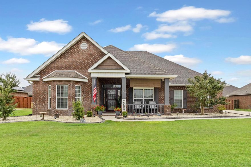 Welcome to the peaceful community of Redstone Commons. This home invites you through a charming covered front porch. As you enter, the foyer divides the large office and formal dining room. The floor plan is open and spacious with abundant storage. The upgraded kitchen provides an expansive island, stylish backsplash, & accent lighting. You'll also find updated LVP flooring throughout. The private master suite offers ultimate relaxation with a garden tub, double vanity, and walk-in closet. This is the only McKenzie style floor plan that has an expanded floor space that moves towards the backyard. You exit to an outdoor oasis with a custom pool, fire pit, and pergola. Meticulously maintained by its sole owner, this home exudes pristine condition and is ready to welcome its next chapter.