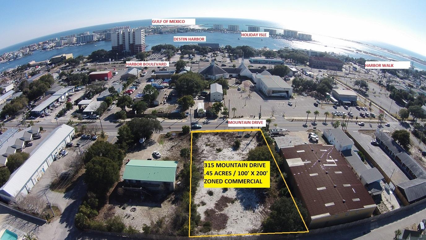 Two adjacent lots in the heart of Destin. High traffic area with newly improved road. Prime location for parking or offices. Development order in place currently for boat storage facility. May be modified.Seller will consider owner financing with a qualified buyer: 30 % down, 10 year amortization schedule, 3 year balloon note, and 6% simple interest with no pre-payment penalty.