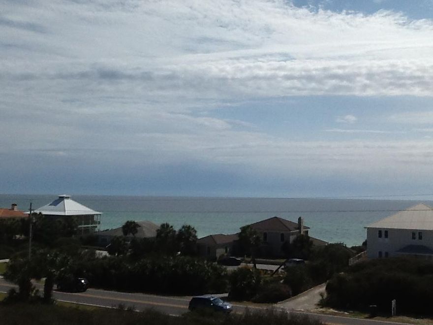 What a Great Estate Sized lot with Fantastic Gulf Views!!Just across the street from Beach Access and next to the Santa Rosa Golf Club. Elevation estimated to be above 30' . This lot is in a cud-de sac and views of the gulf are fabulous from this hillside location. Perfect location on 30A just a few steps from the Gulf and Gulf Place Town Center with shopping and dining. Just across from the Vue restaurant. Gated community with deeded beach access. Make this fabulous location your perfect piece of paradise!