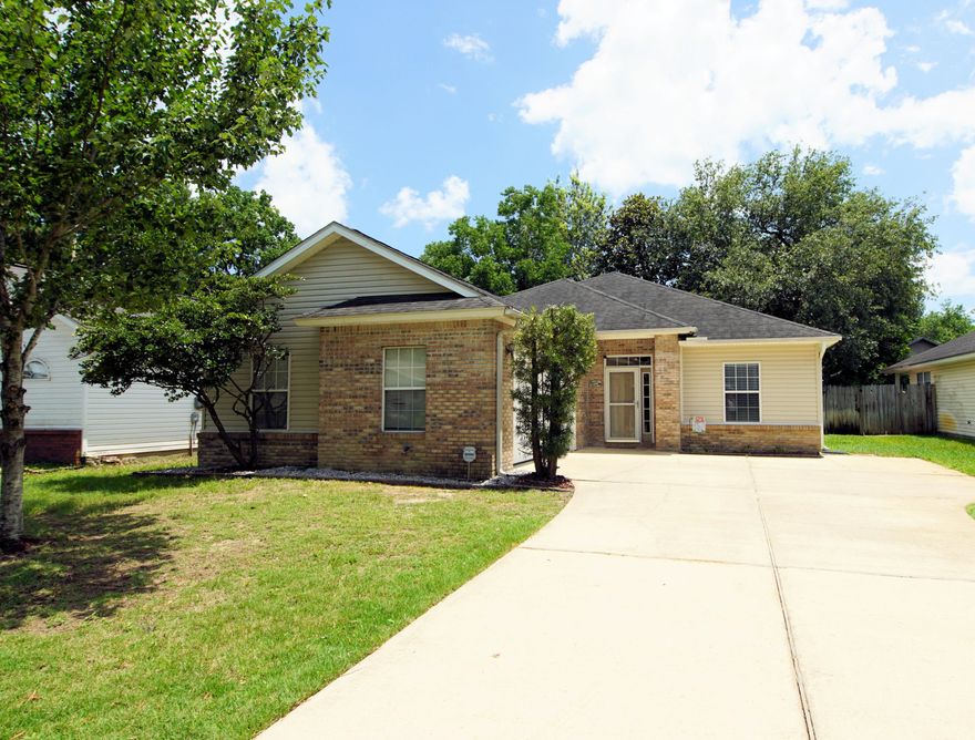 Move in ready 4 bedroom and 2 bath home with 1619 sq ft centrally located in Fort Walton Beach! New 2019 Roof with 30 year dimensional shingles and basic home warranty to be offered with this home with an acceptable offer! This home is close to the beaches, military bases, shopping and restaurants! Pride of ownership shows in this home! Enter the home through the storm door and notice the wide entry way with niche shelving complete with ambiance lighting! The living room features tray ceilings with decorative molding and lighting that creates a very elegant look and makes the ceiling height look higher! The home has an open floor plan with the kitchen and eat-in area opening to the living room!